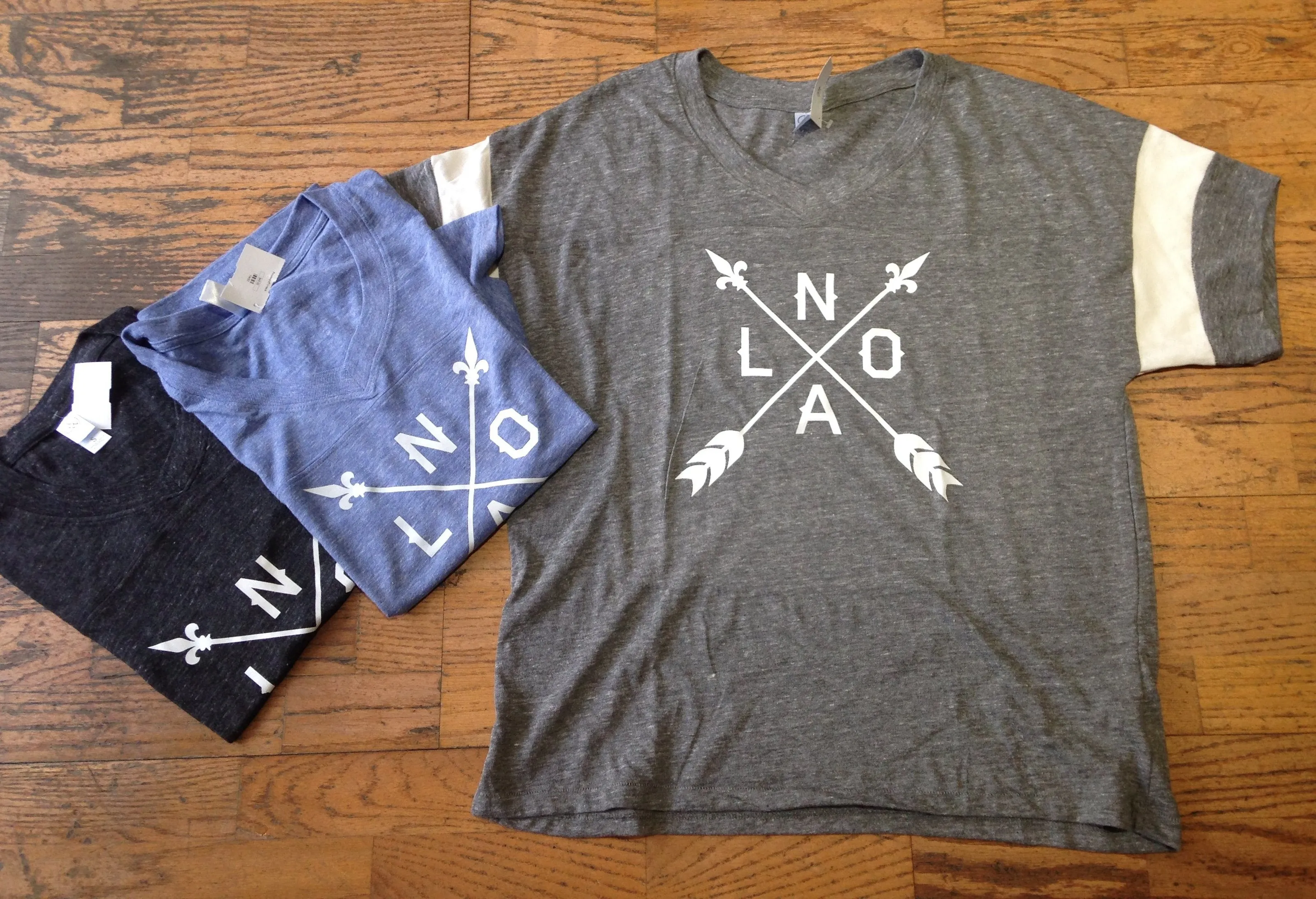 NOLA Arrows, Powder Puff Eco-Jersey T-Shirt, Unisex